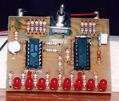 The completed circuit board. The prototype used vertically mounted trimmer potentiometers rather than the more convenient horizontally mounted ones in the parts list. Notice the extra adjusting resistor installed in the R1 group.